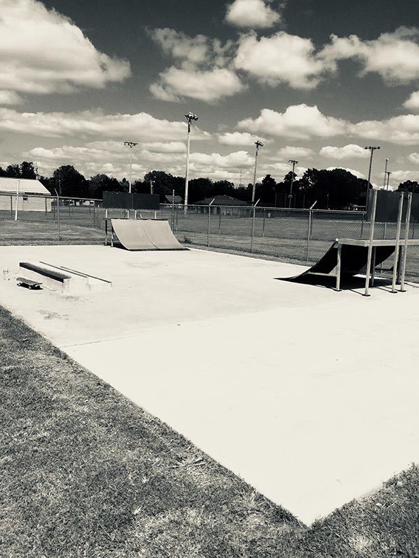 skatepark surrounded by baseball fields