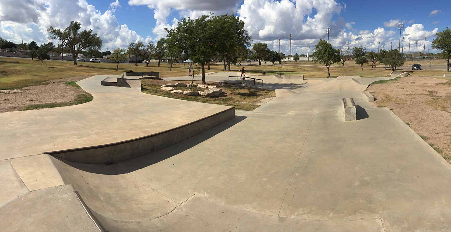 Skatepark that is an undulating cement strip bent into a circle